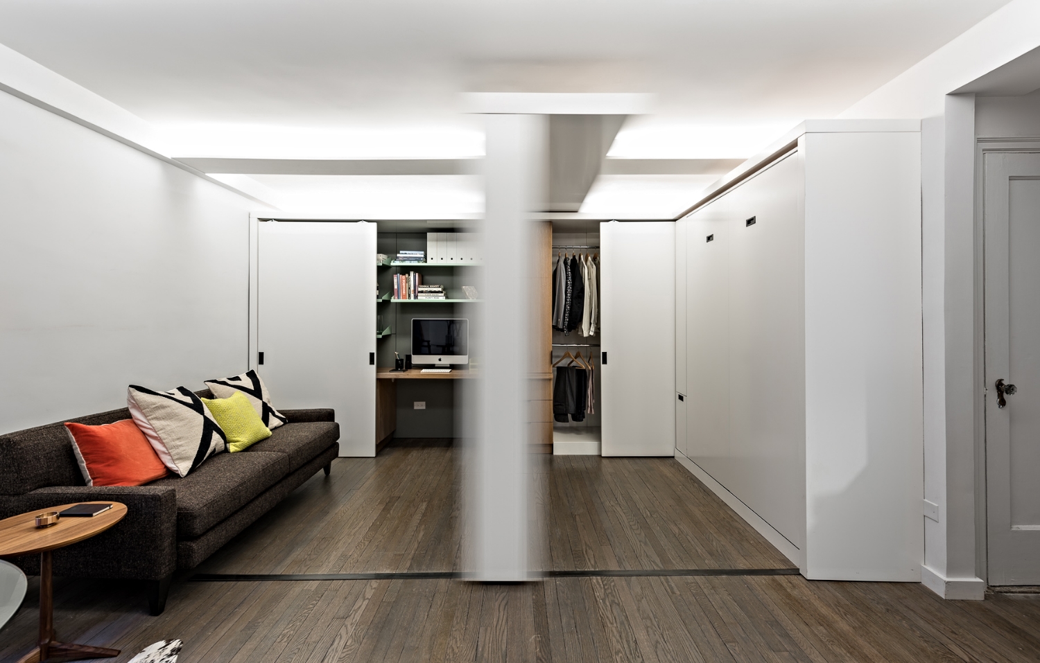 Micro-Apartment Opens Up With Hidden Storage and Glass Walls