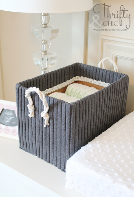 diy storage box created by outfitting an old diaper box in a sweater