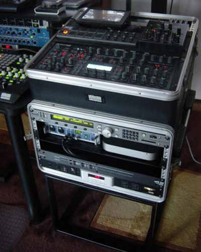 a portable rack stores a 7" lcd, m-resonator, lpd8, fireface 400, and mac mini