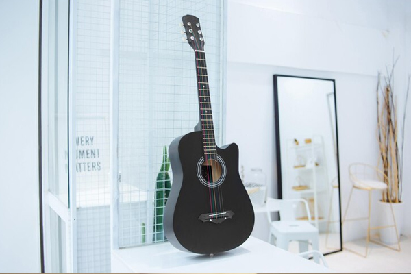 a guitar in a room