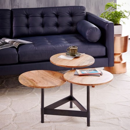 https://www.clutter.com/blog/wp-content/uploads/2016/04/04164946/tiered-circles-coffee-table-e1459803004660.jpg