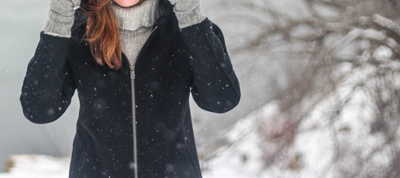 girl in winter coat in snow