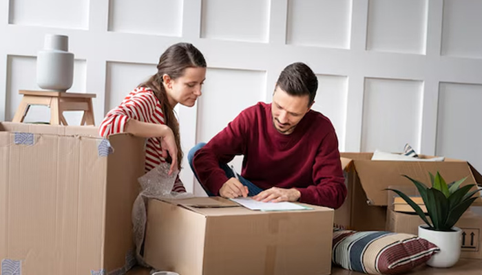 Young family moving into a new apartment