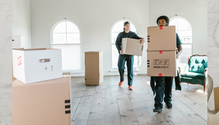 group of people preparing for move