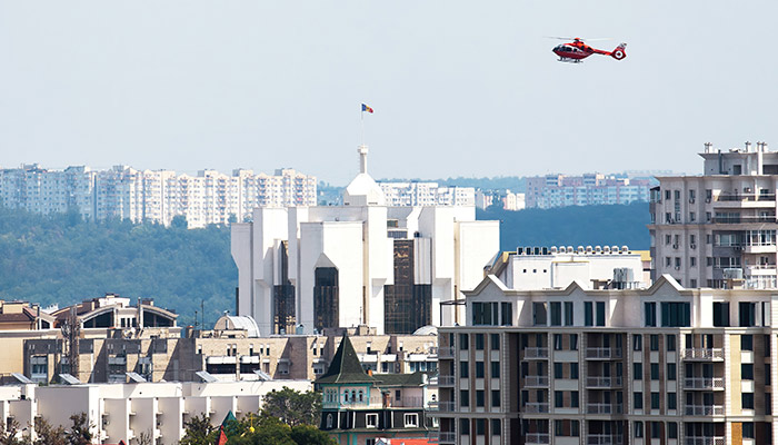 Helicopter flying over the presidency and high residential buildings