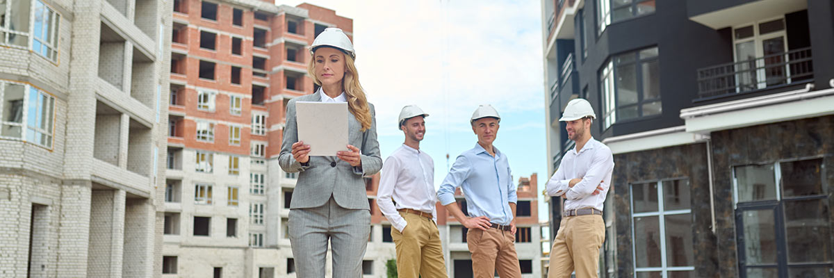 Construction team with female leader on-site