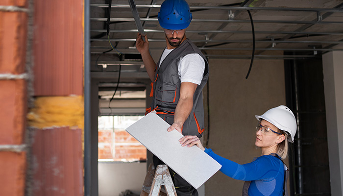 people working as a team on a construction site