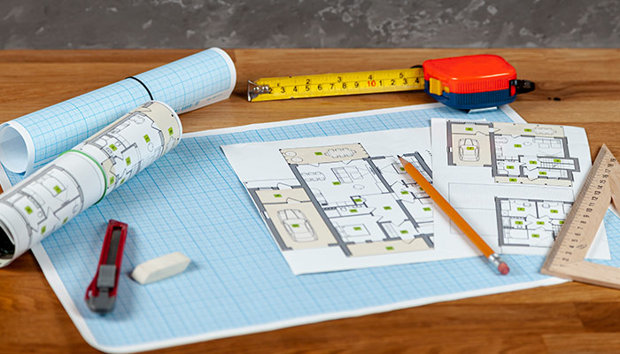 Blueprints and tools for calculating home construction costs