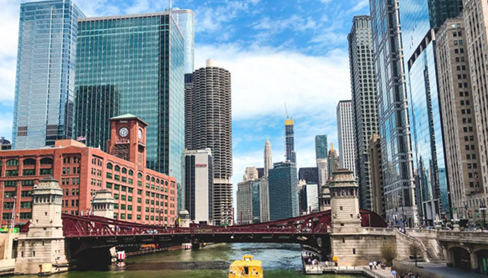 Beautiful wide shot of the Chicago River with amazing modern architecture