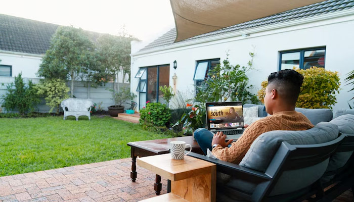 man using laptop outdoor