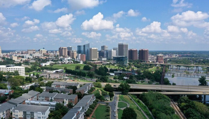 Beautiful shot of Zilker skyline with a cloudy blue sky