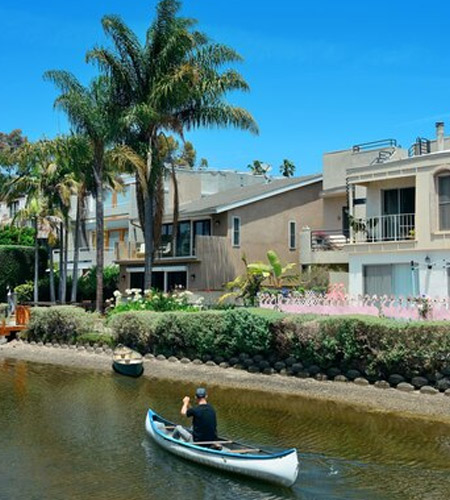 Canals Walkway with river and boat