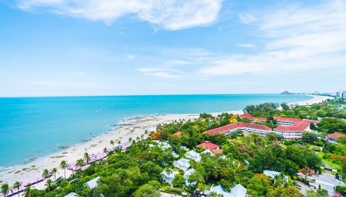 Scenic seascape with blue waters and a golf course in view